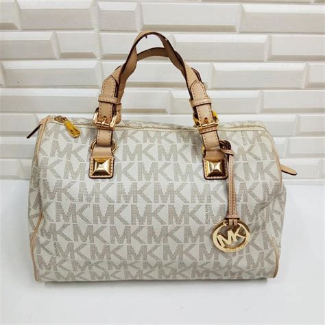 michael kors replica bags wholesale|michael kors makeup bag outlet.